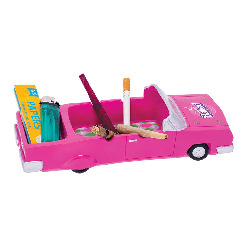 Pink Baked Convertible Ashtray showing storage for papers and a lighter with rests holding cones across the center.