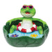 Front view showing the frog in pink shades lounging in a leaf bowl with a rim notch