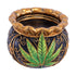 Front angle of the black-and-gold Royal Leaf Cauldron Ashtray with green leaf motif.
