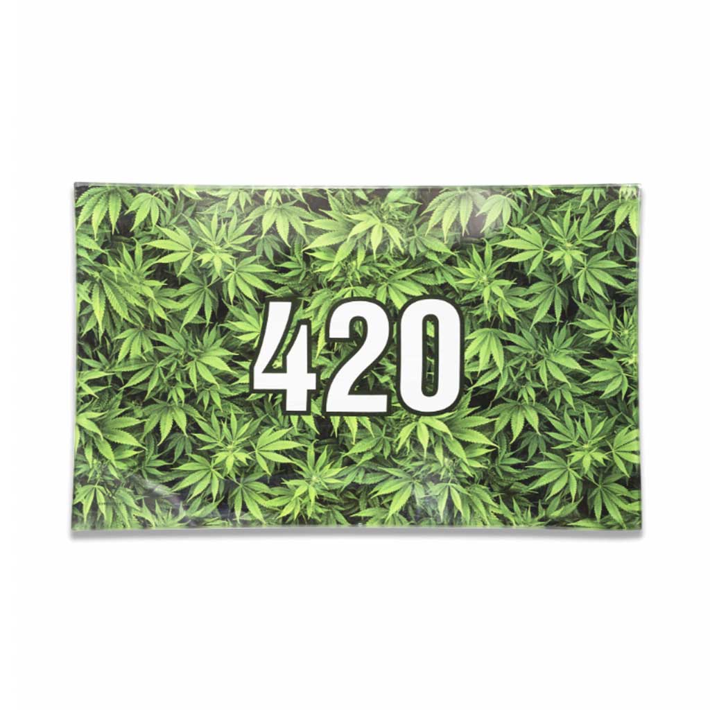 Top view of medium green 420 glass rolling tray featuring leaf pattern and large 420 graphic; smooth, easy-clean