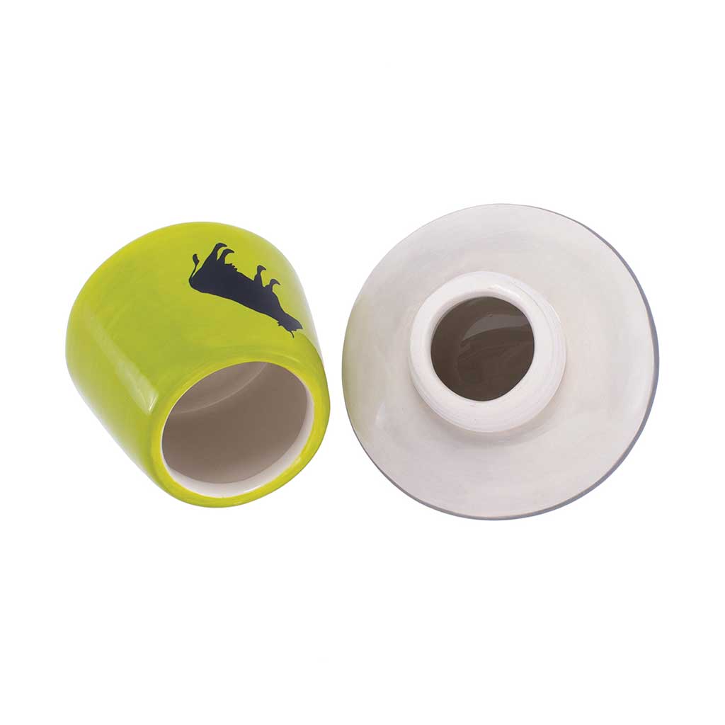 Base and saucer lid separated, showing the ceramic jar cavity and threaded opening