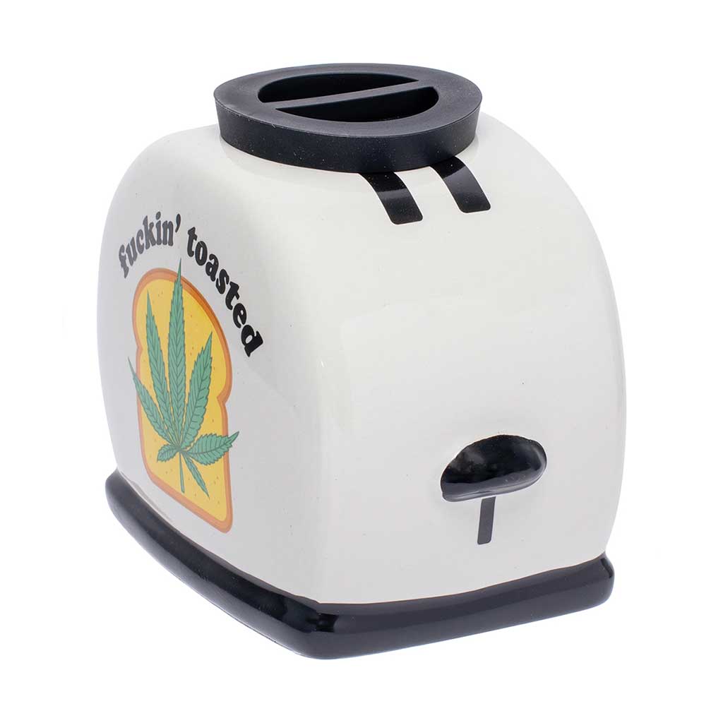 Angled view of the Large Toasted Ceramic Stash Jar in white with a black lid and side lever detail