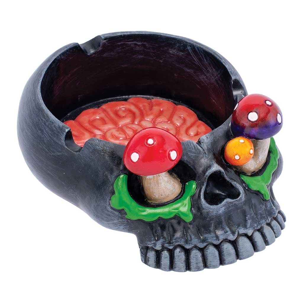 Angled view of the Black Skull Pink Brain & Mushroom Eyes Ashtray with black skull and red brain bowl.
