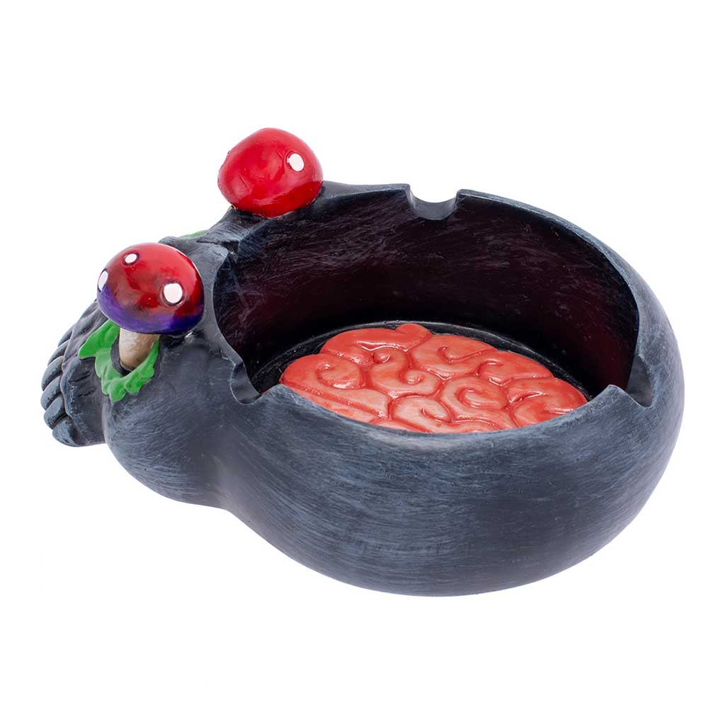 Side angle of the Black Skull Pink Brain & Mushroom Eyes Ashtray with glossy red and purple mushroom eyes.