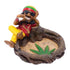 Jamaican Chilling on Stump Ashtray, multicolor resin, relaxed figure on a tree-stump dish
