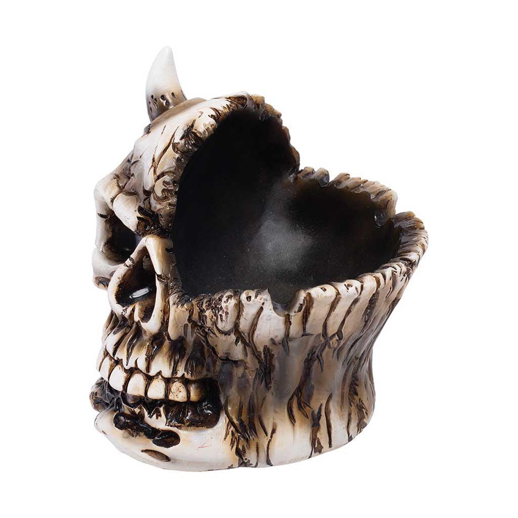 Half Skull Ashtray in bone resin, angled view with deep charcoal bowl and jagged rim