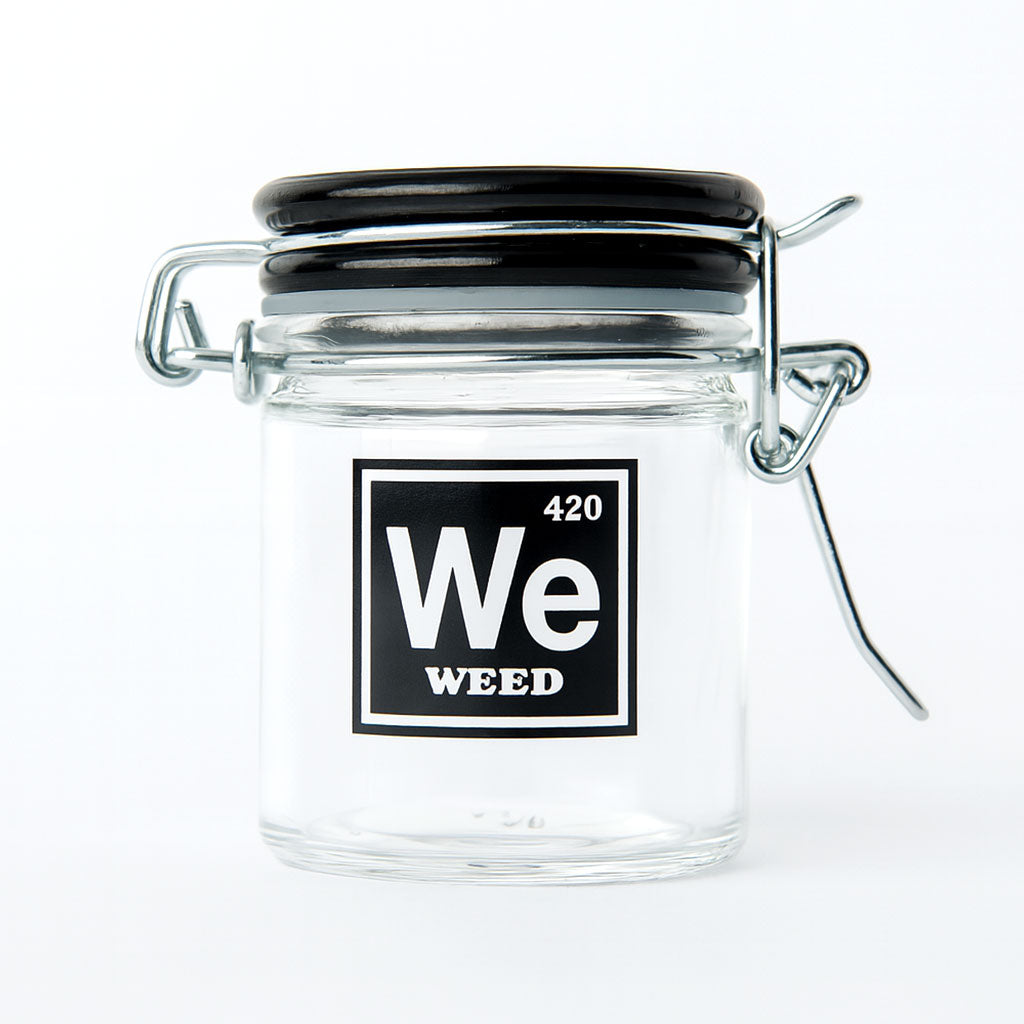 Airtight glass storage jar with 5 Oz. Medium Weed Periodic Symbol design by Ted Miller Innovations