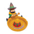 Yellow sombrero ashtray with a gnome playing guitar at the rim, round bowl, and notch rests visible.