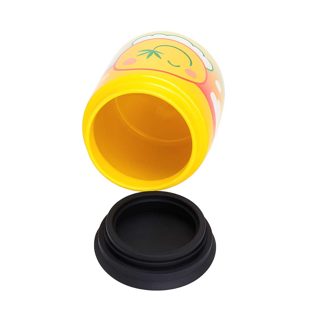 Stoned Smiley yellow ceramic jar shown with the lid off to reveal the opening. 