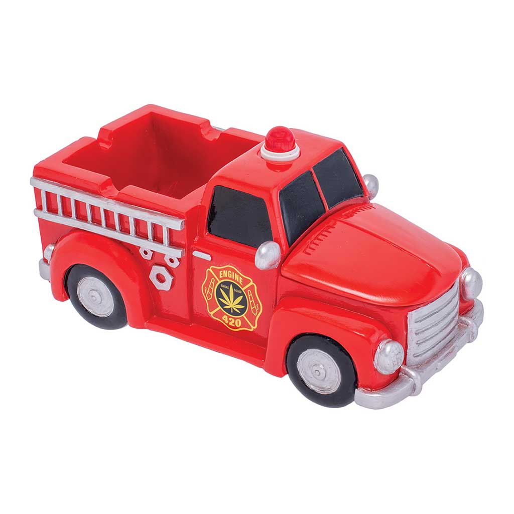 Front angle of the Red 420 Light-Up Firetruck Ashtray & Stash, compact red truck with beacon.