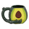 Green avocado shaped Roast & Toast pipe mug with dark textured handle and built-in smoking pipe design
