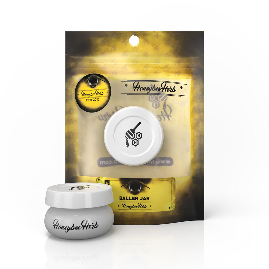 white baller dab jar in retail packaging, odor-blocking stash jar