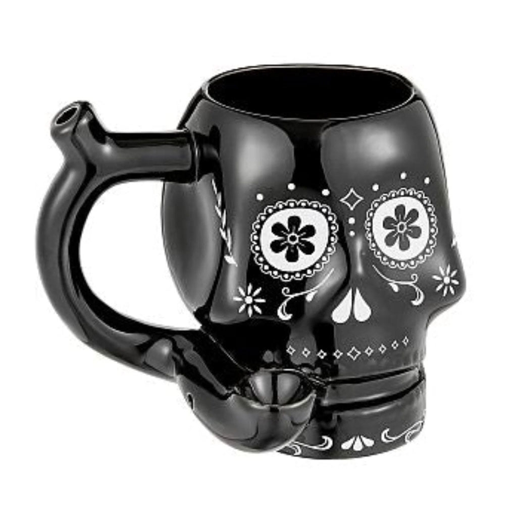Black Skull Premium Roast and Toast pipe mug with glossy black finish, white floral skull artwork, built-in front bowl, and curved handle