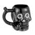 Black Skull Premium Roast and Toast pipe mug with glossy black finish, white floral skull artwork, built-in front bowl, and curved handle