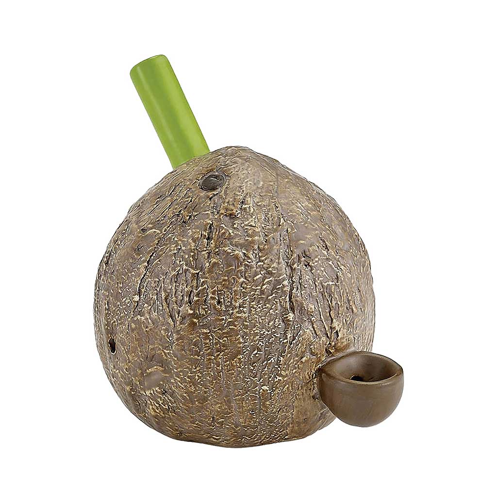 Coconut hand pipe with brown textured coconut body, green leaf stem mouthpiece, side bowl, carb hole, and tropical ceramic design