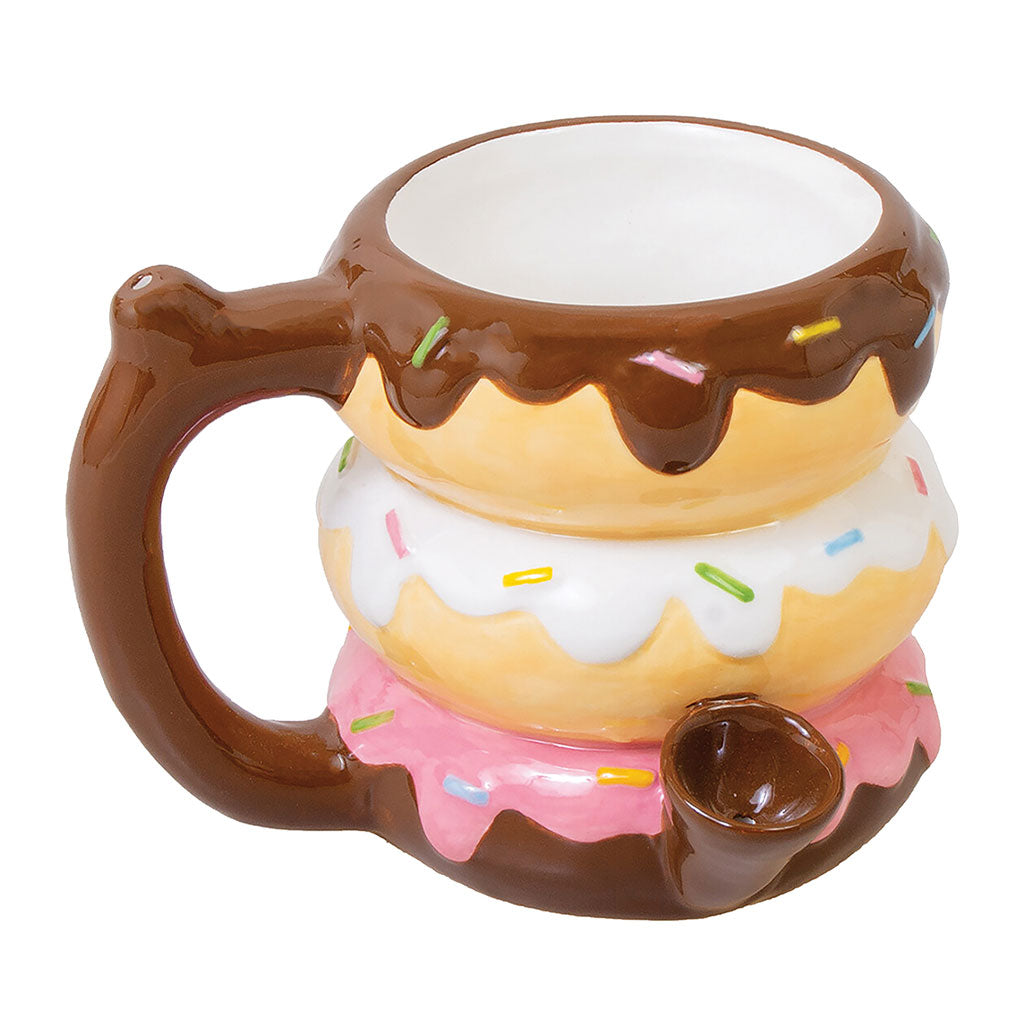 Donut Premium Roast and Toast pipe mug with glossy chocolate, vanilla, and pink icing layers, colorful sprinkles, curved handle, and front bowl