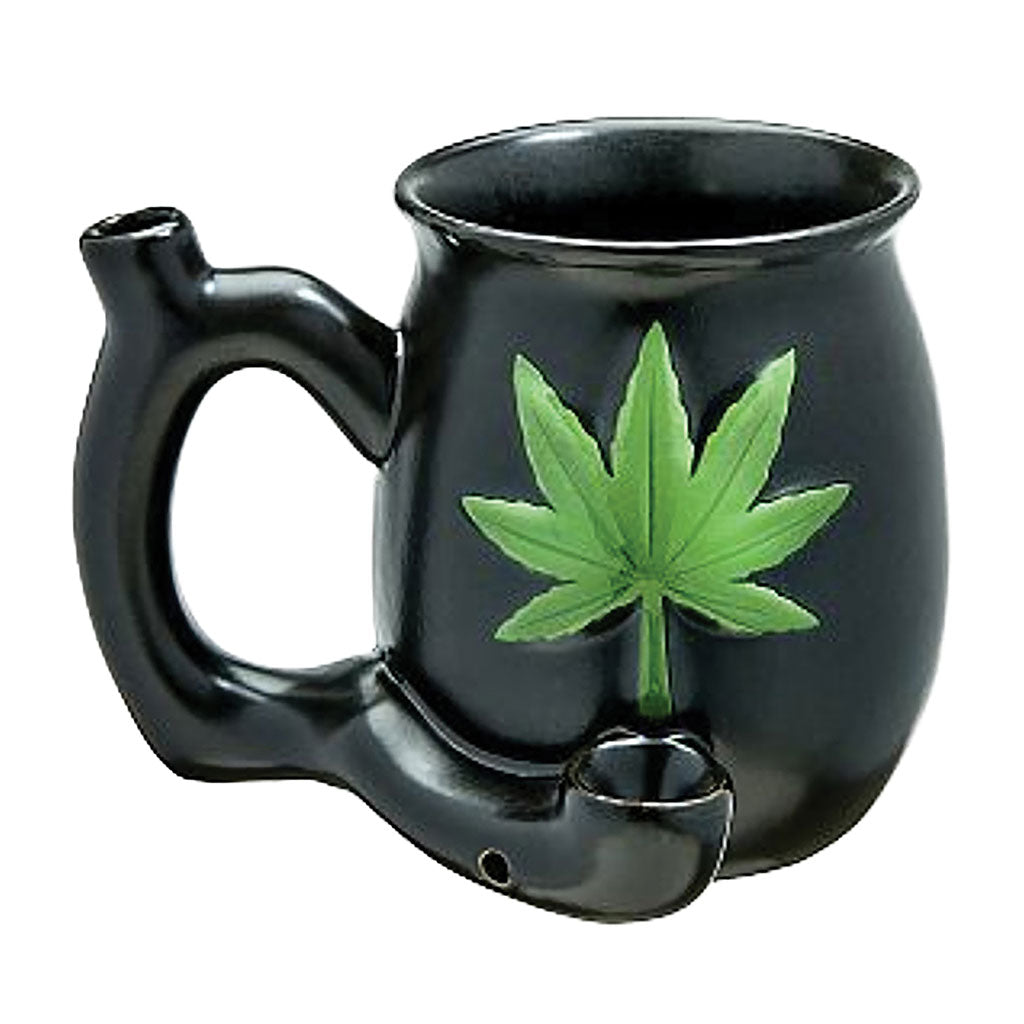 Black ceramic pipe mug featuring a green leaf design, labeled as a 