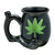 Black ceramic pipe mug featuring a green leaf design, labeled as a "Roast & Toast" by Fashion Craft.