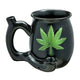 Black ceramic pipe mug featuring a green leaf design, labeled as a "Roast & Toast" by Fashion Craft.