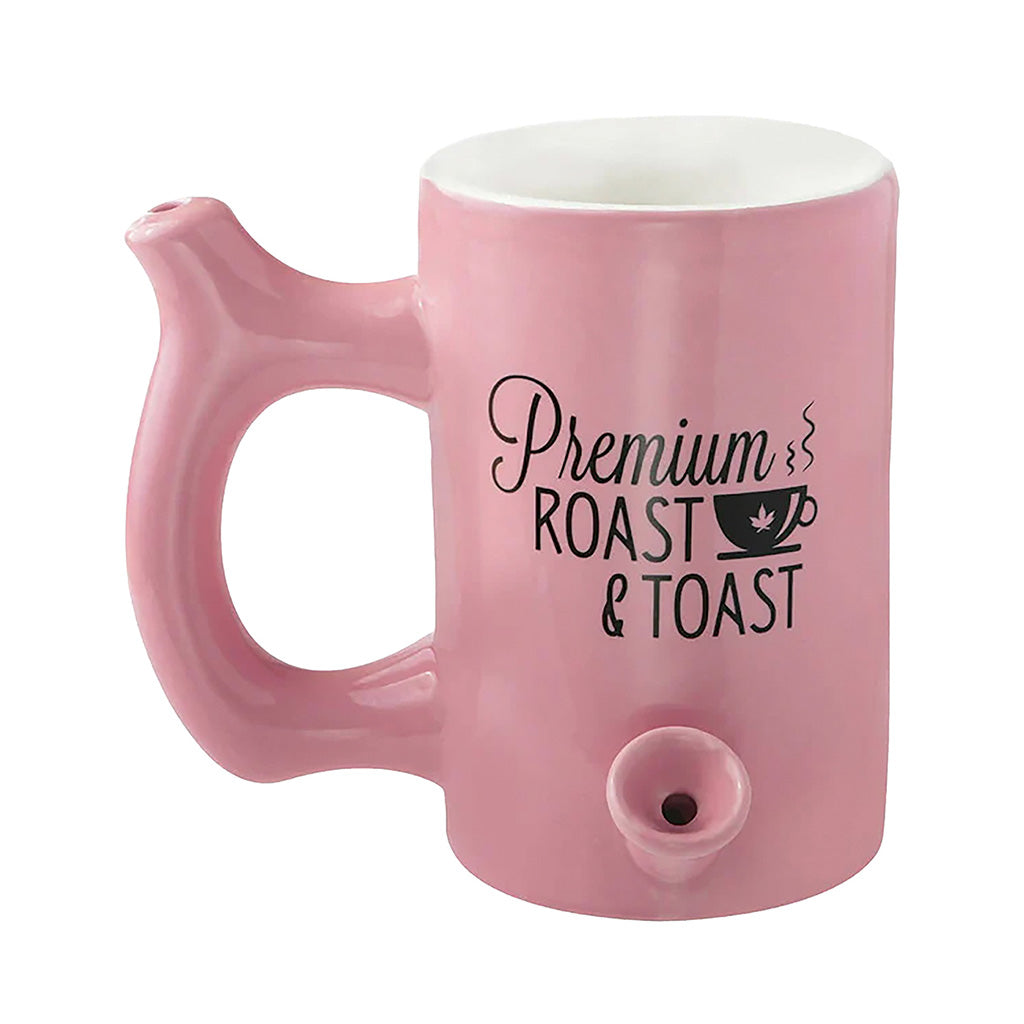 Pink ceramic Premium Roast & Toast pipe mug with a spout for smoking, showcasing a fun design.