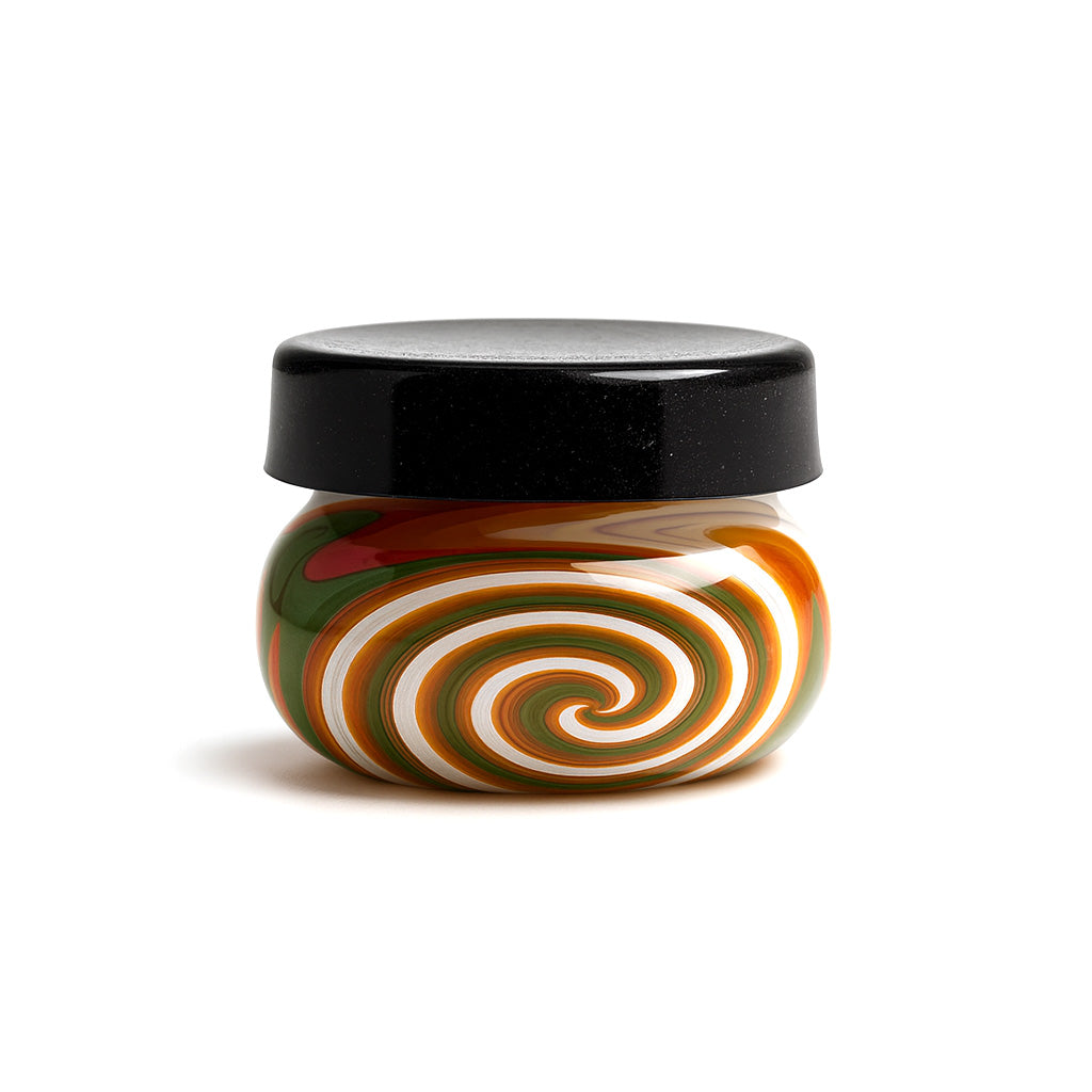 Forest Blaze Rounded Wig Wag Swirl Baller Storage Jar shown with a black lid at Honeybee Herb