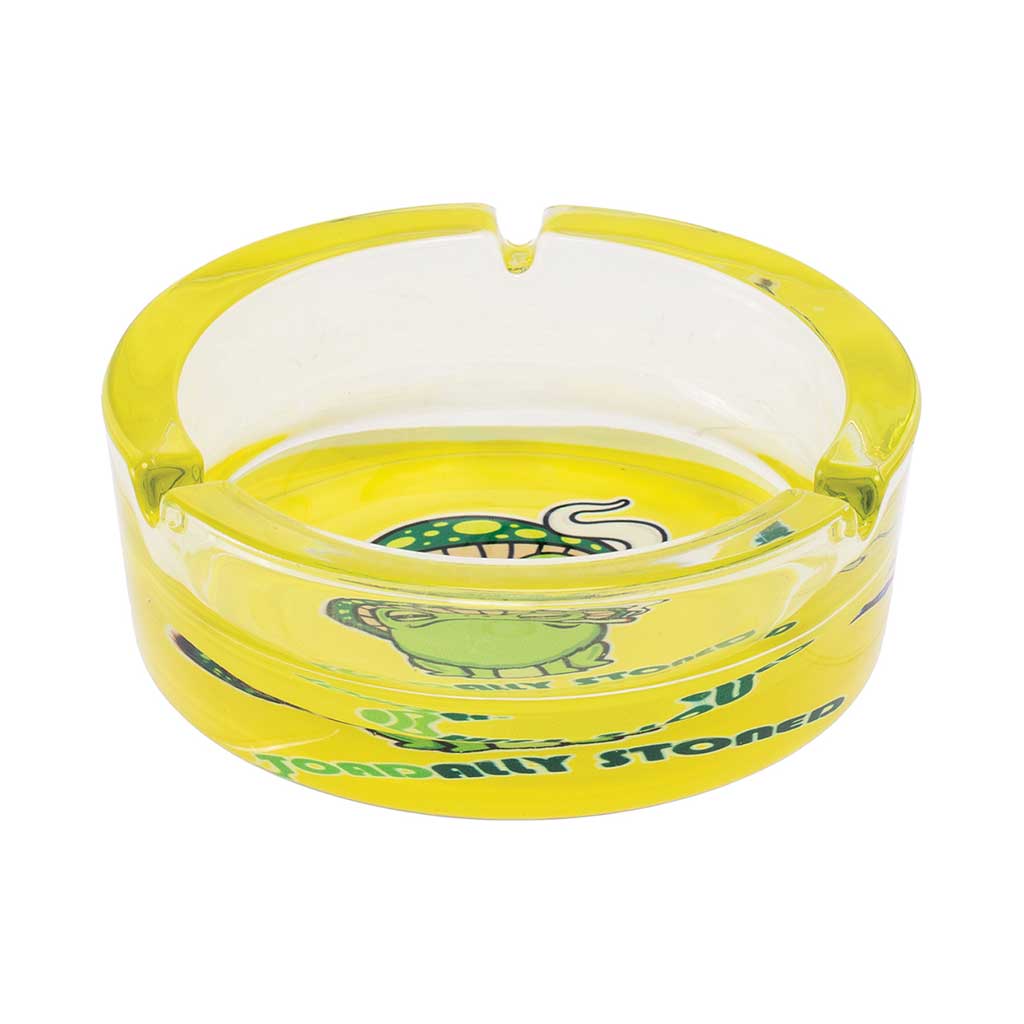 Side View Of Yellow Fujima Medium Glass Ashtray With Single Notch And “Toadally Stoned” Toad Graphic 