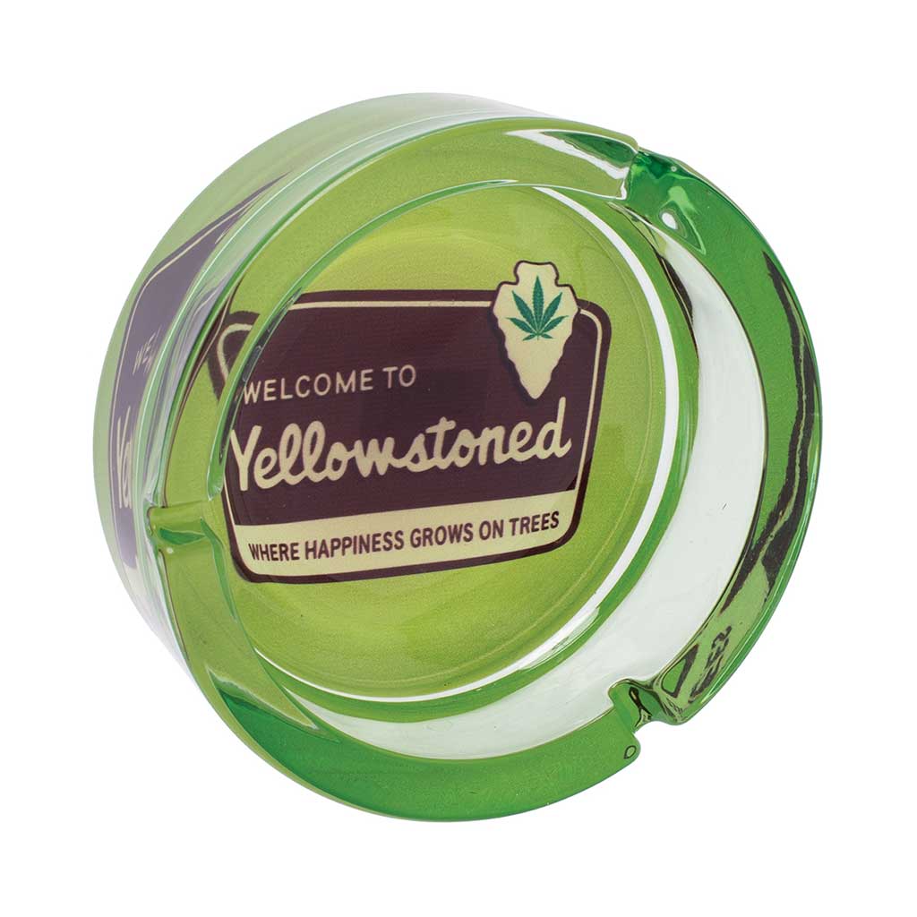 Top View Of 5-In Green Glass Ashtray With “Welcome To Yellowstoned” Badge And Leaf Icon 