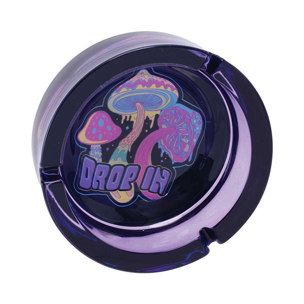 Top View Of Purple Glass Ashtray With Colorful Mushroom Design And Text “Drop In”