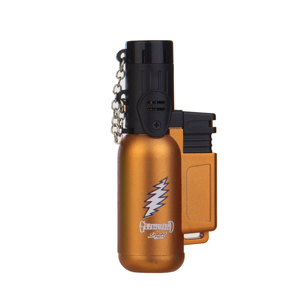orange grateful dead tron metal mini butane torch, compact and refillable—shop Honeybee Herb.