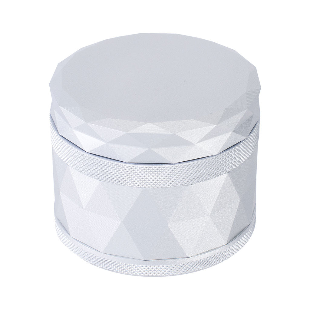 Silver Harlequin Pattern Grinder with geometric diamond design and textured grip for premium herb grinding