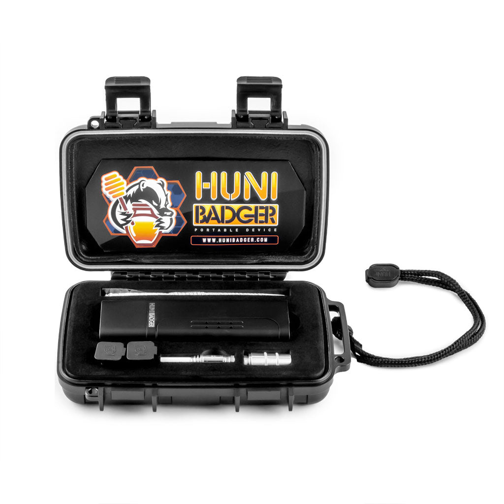 Top view of black Huni Badger vaporizer kit with parts in custom case