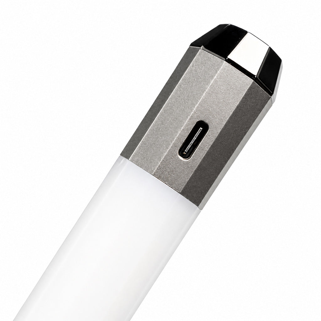 Close-up of Litsaber OG interactive LED battery's detailed design with visible charging connections.
