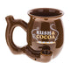 Kush and Cocoa chubby roast and toast pipe mug with glossy brown finish, pipe-style handle, built-in front bowl, and side carb hole
