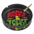 Large Roast and Toast ceramic ashtray with wide tray base, novelty text design, deep ash slots, and glossy ceramic finish