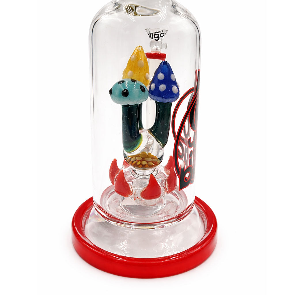 Close-up of the red Lookah BIIGO mushroom perc showing colorful worked mushroom glass and red spike detail inside the clear chamber