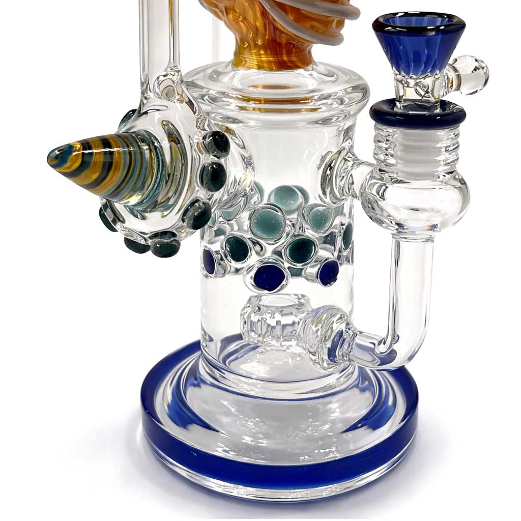 Close up of the blue base and bowl connection on Lookah Crazy Clown recycler dab rig showing detailed glasswork and smooth water cooling design