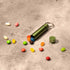 ONGROK storage keychain open, displaying versatile storage capacity with colorful items 