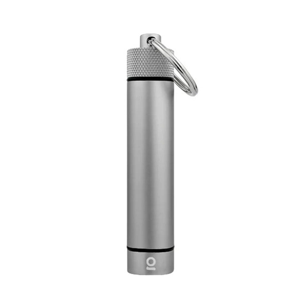 Gun Metal ONGROK airtight aluminum storage keychain on white background, available online. 
