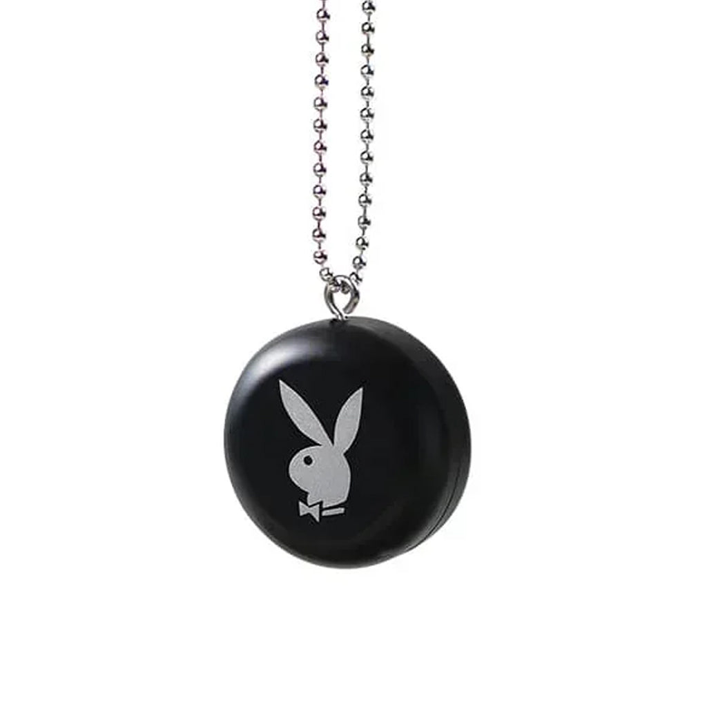 Side view of the black Playboy by Ryot Pendant Puck highlighting its compact size and smooth finish.