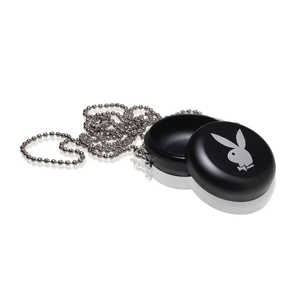 Another close-up of the Playboy by Ryot Pendant Puck, focusing on the textured surface.