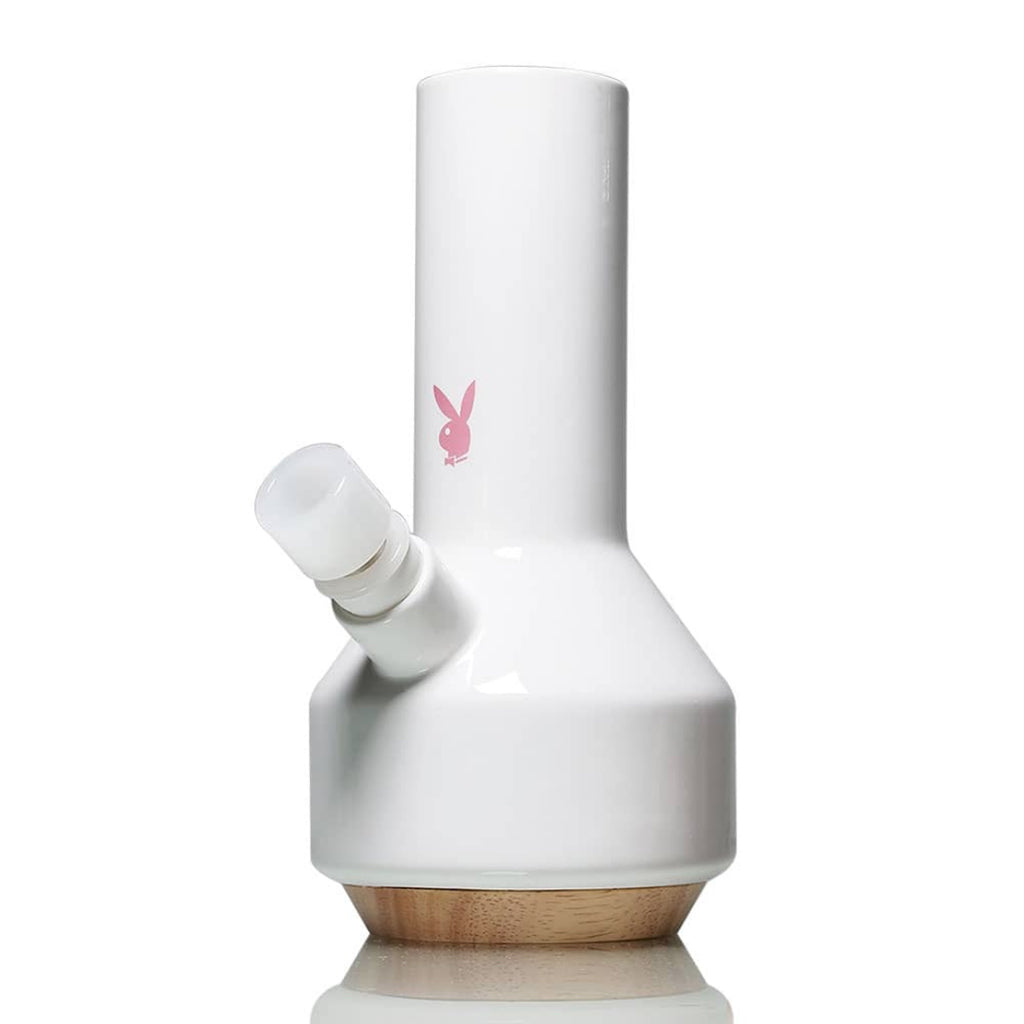 Full product view of a white ceramic Playboy by Ryot Traveller water pipe.