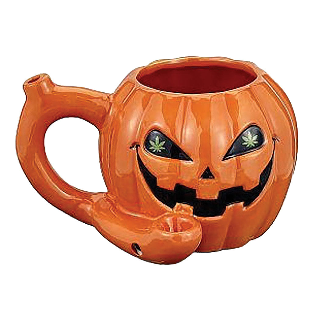 Orange Pumpkin Roast and Toast pipe mug with jack o lantern face, handle pipe, side bowl, and cannabis leaf eyes for adult smoking accessory buyers