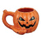 Orange Pumpkin Roast and Toast pipe mug with jack o lantern face, handle pipe, side bowl, and cannabis leaf eyes for adult smoking accessory buyers