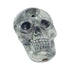 Shop skull ceramic hand pipe, angled view showing carb hole and mouthpiece—add to cart now. 