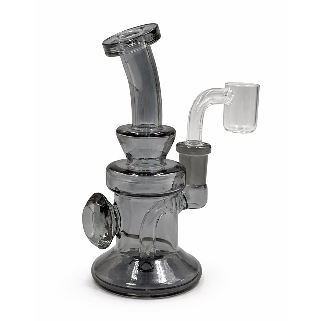 Smoke tinted mini dab rig with bent neck and quartz banger, compact glass concentrate rig with a wide base for steady pulls.