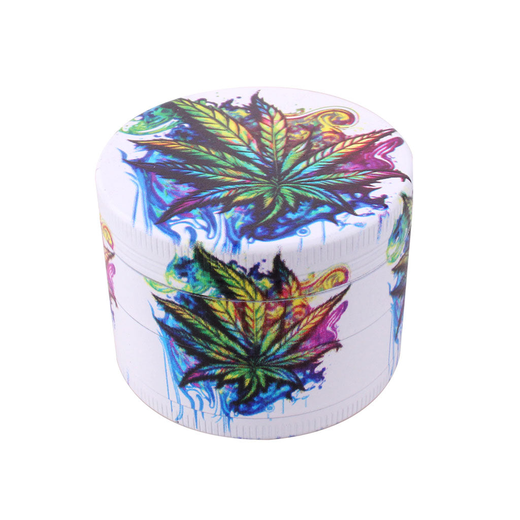 White 4-piece aluminum herb grinder with purple smoke splash artwork and cannabis leaf, lid view