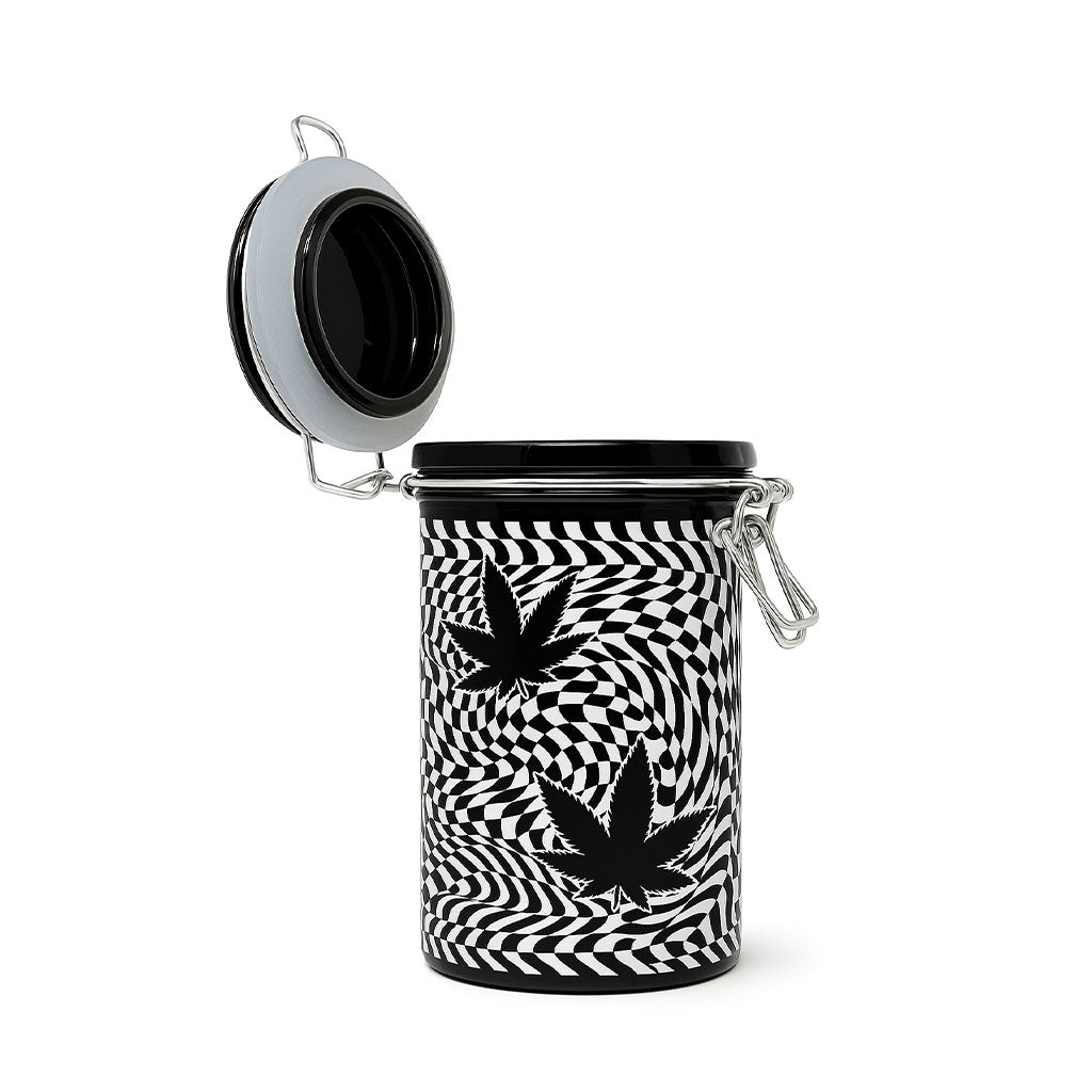 Tall Ted Miller Innovations Checkerboard Leaves 6-Inch Storage Jar With Lid Open And Dual Leaf Design, Secured With A Clamp.