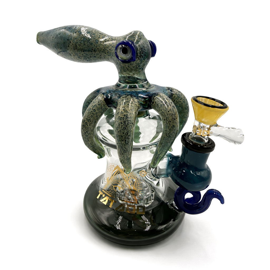 Side view of TATAOO Lookah sandblasted talisman glass rig in blue green highlighting the sculpted body and sturdy base built for daily sessions