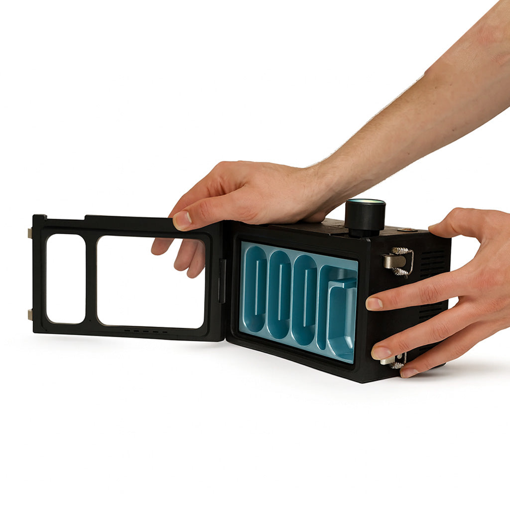 The Box by Lidavel black dab rig chiller with clear hose and glass banger adapter set up for smooth, cooled dabs. 