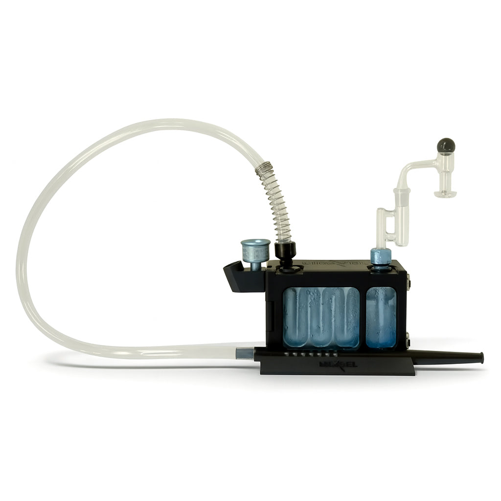 Hands loading The Box by Lidavel black dab rig chiller tray, showing easy setup and cleaning for buyers at Honeybee Herb. 